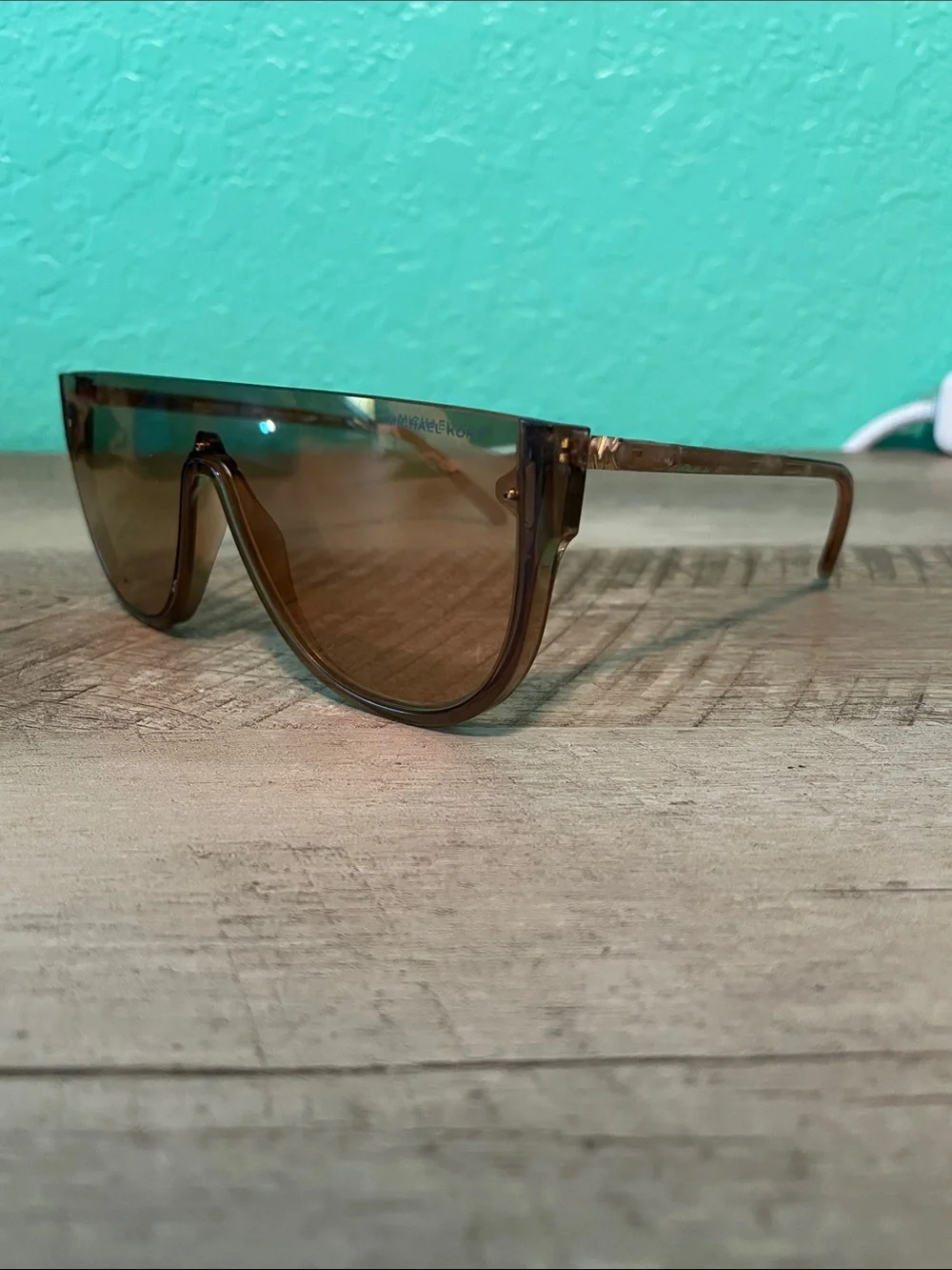 Michael Kors Unisex MK2151 Aspen Amber Rimless Shield Sunglasses